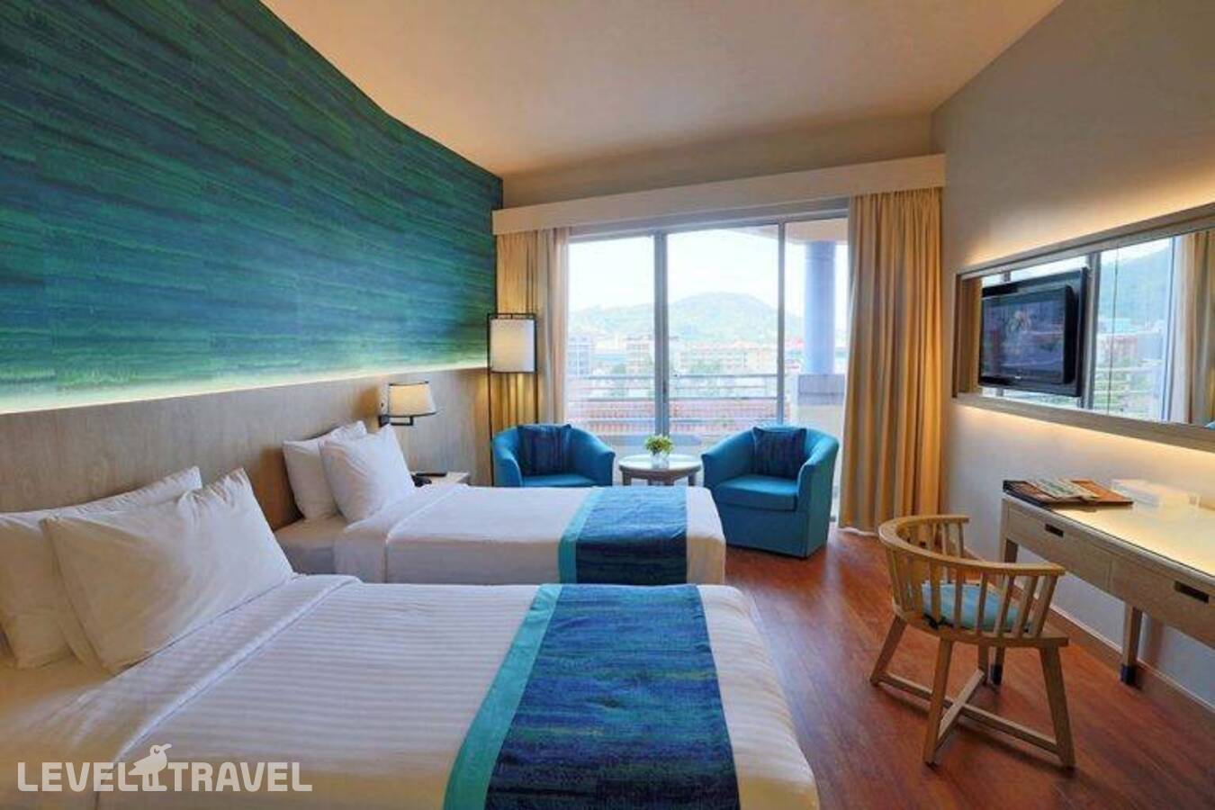 фотографии номера Делюкс с частичным видом на море отеля The Royal Paradise Hotel & Spa в Таиланд(Патонг Бич) - фото №7