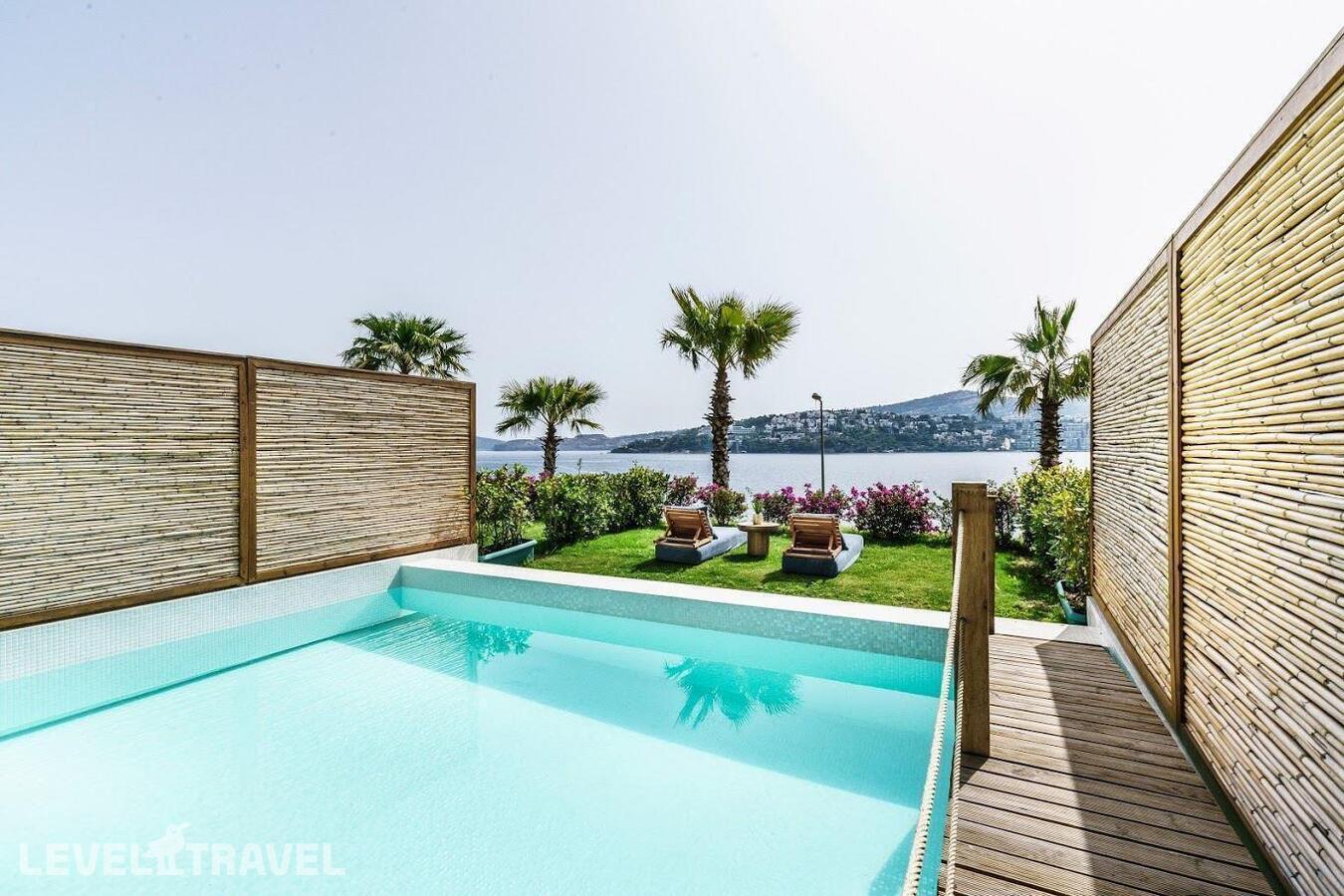 фотографии номера Представительский люкс (2 спальни) отеля Cape Beach Resort Bodrum в Турция(Гюндоган) - фото №1