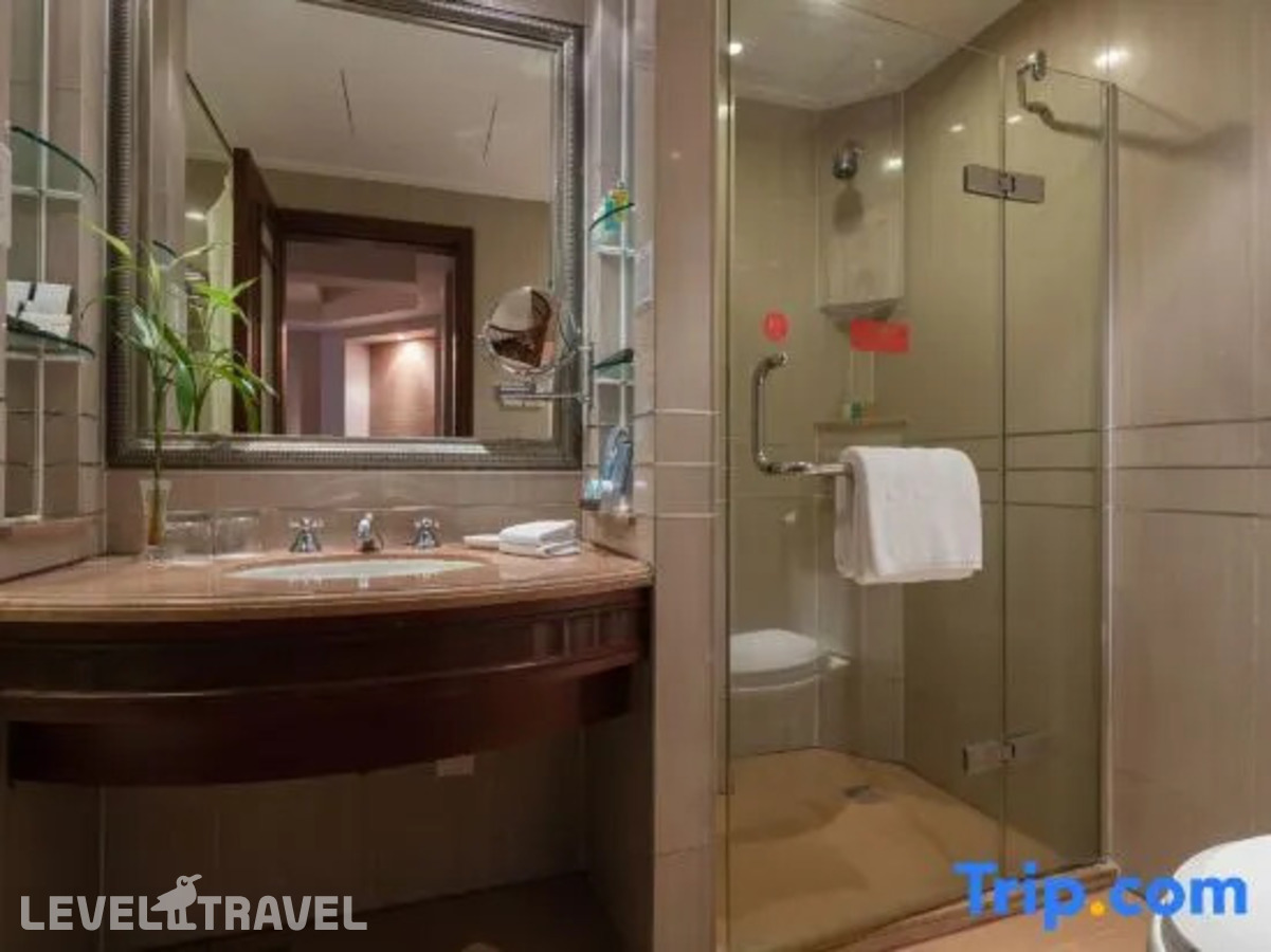 фотографии номера Улучшенный (две односпальные кровати) отеля Sanya Jinjiang Baohong Hotel Annex Building в Китай(Дадунхай Бэй) - фото №3