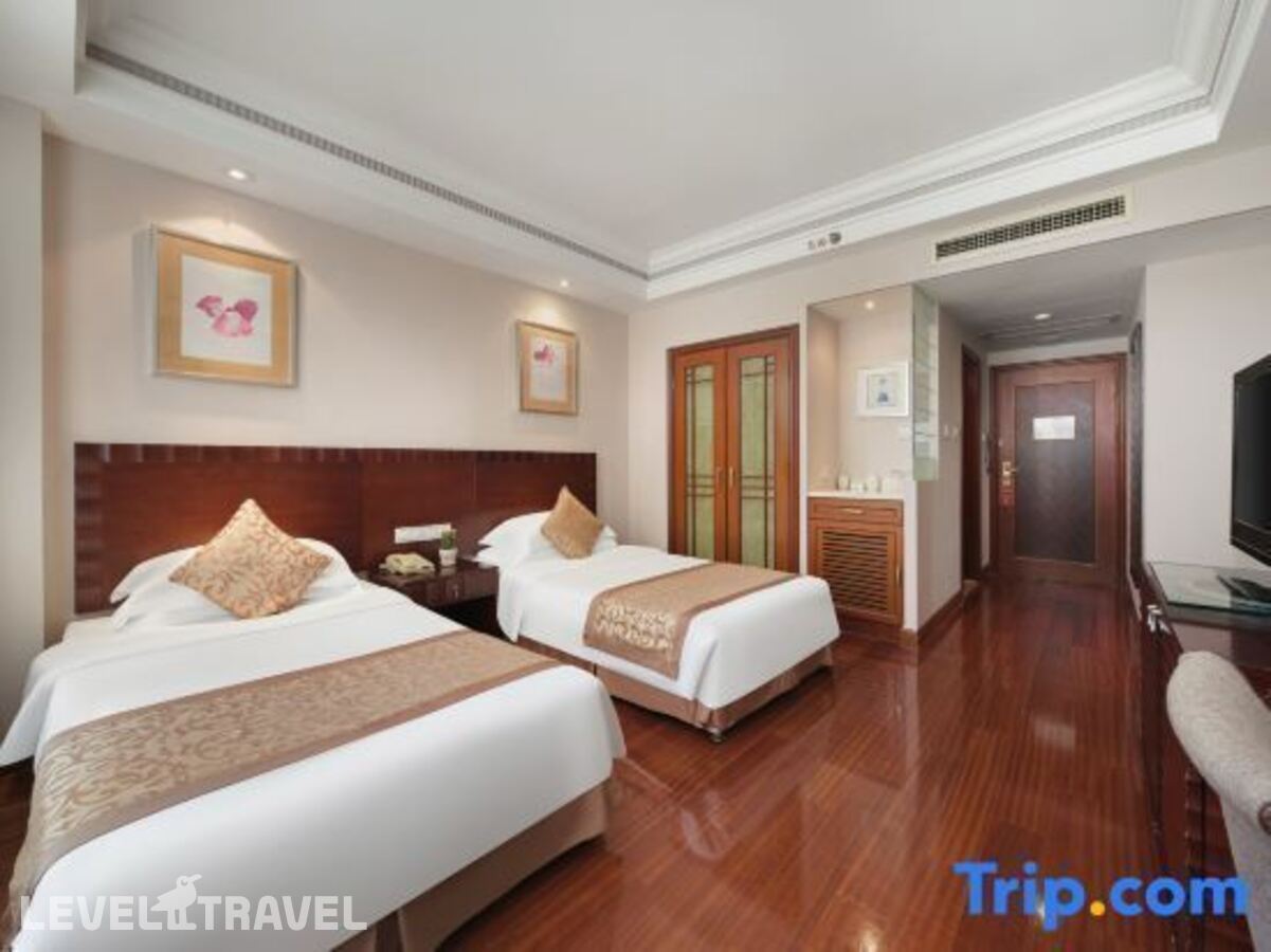 фотографии номера Улучшенный (две односпальные кровати) отеля Sanya Jinjiang Baohong Hotel Annex Building в Китай(Дадунхай Бэй) - фото №1