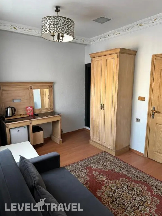 фотографии номера Трёхместный номер Семейный отеля Blue Tuana Suite в Турция(Фатих) - фото №6