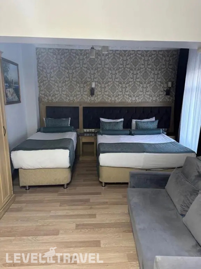 фотографии номера Трёхместный номер Семейный отеля Blue Tuana Suite в Турция(Фатих) - фото №2