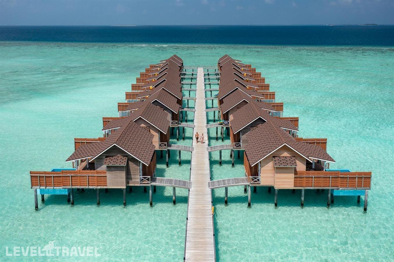 фотографии номера Вилла на воде Sunset с бассейном отеля Dhigufaru Island Resort в Мальдивы(Баа Атолл) - фото №1