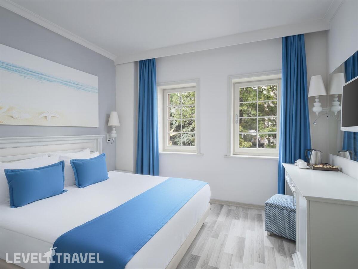 фотографии номера Семейный номер отеля Selectum Collection Bodrum (Ех. Kairaba Bodrum Imperial) в Турция(Ортакент) - фото №1