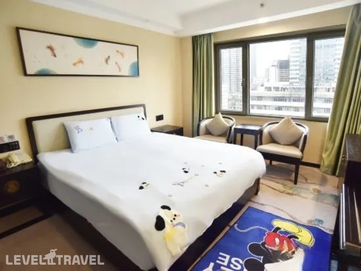 фотографии номера Семейный номер отеля Guangdong Hotel в Китай(Гуанчжоу) - фото №2