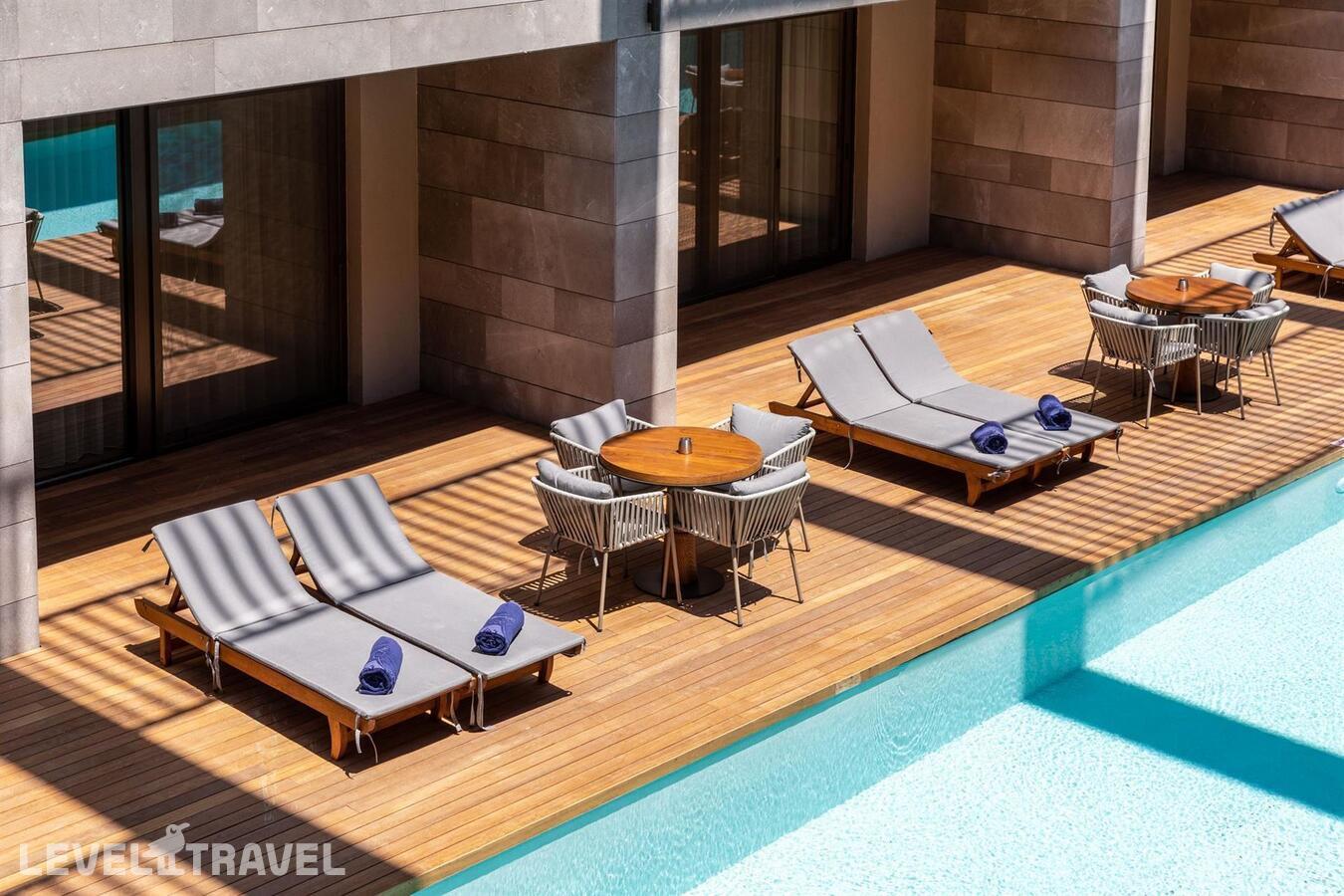 фотографии номера Улучшенный Swim Up с видом на окрестности отеля Kaya Palazzo Resort & Residence Le Chic Bodrum в Турция(Гюмбет) - фото №3