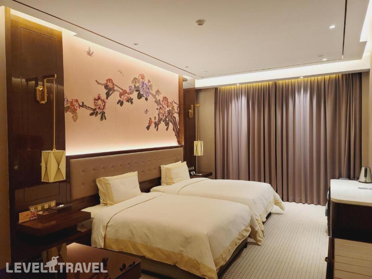 фотографии номера Делюкс с видом на сад (две односпальные кровати) отеля Shanghai Royal Garden Hotel в Китай(Шанхай) - фото №3