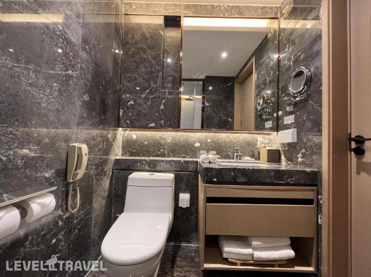 фотографии номера Улучшенный (две односпальные кровати) отеля Howard Johnson Paragon Hotel в Китай(Пекин) - фото №5