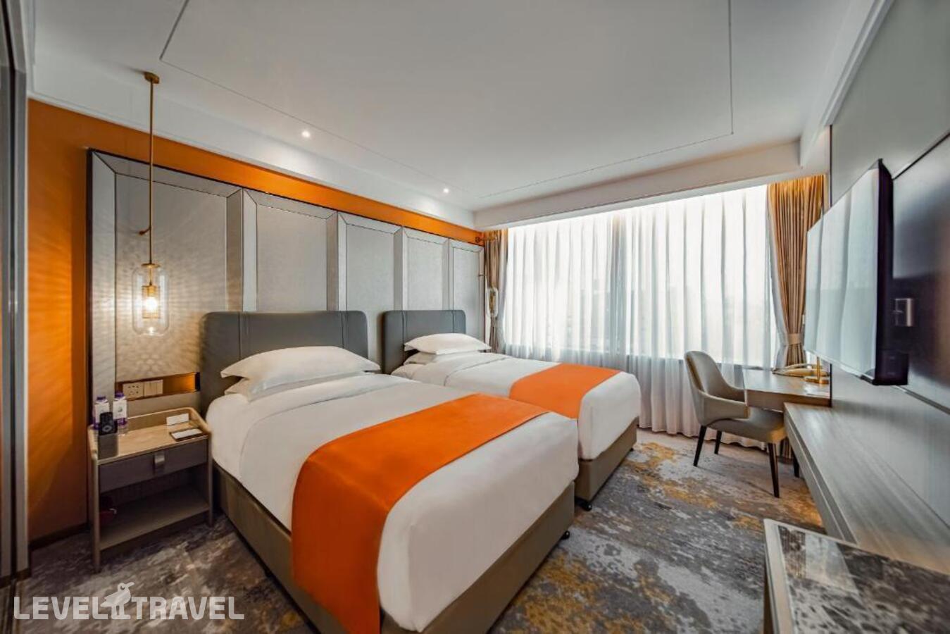 фотографии номера Улучшенный (две односпальные кровати) отеля Howard Johnson Paragon Hotel в Китай(Пекин) - фото №6