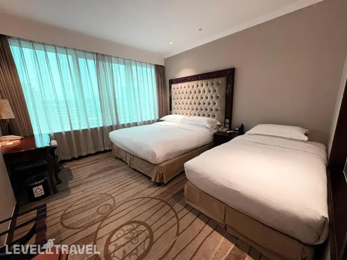 фотографии номера Семейный номер отеля Howard Johnson Paragon Hotel в Китай(Пекин) - фото №1