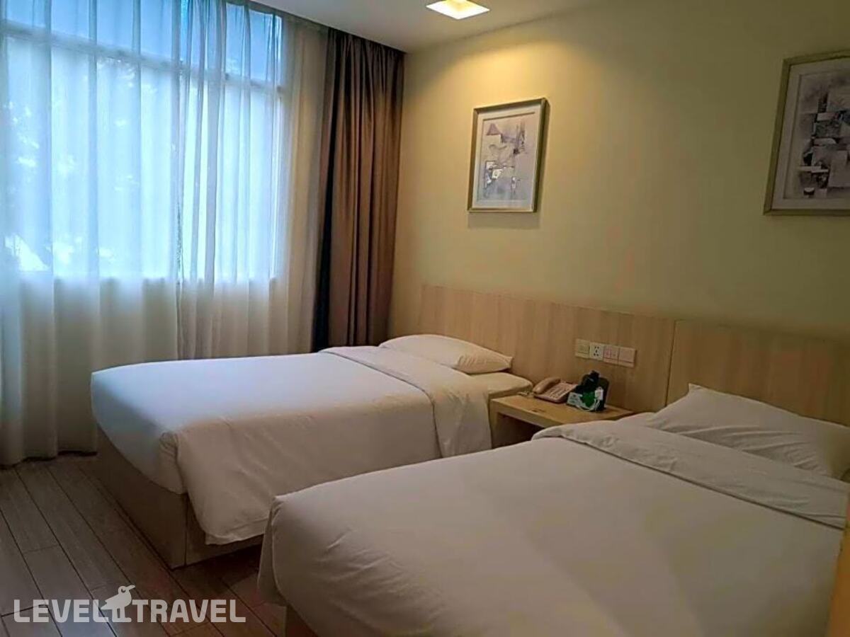 фотографии номера Стандартный (две односпальные кровати) отеля Baiyun City Hotel в Китай(Гуанчжоу) - фото №1