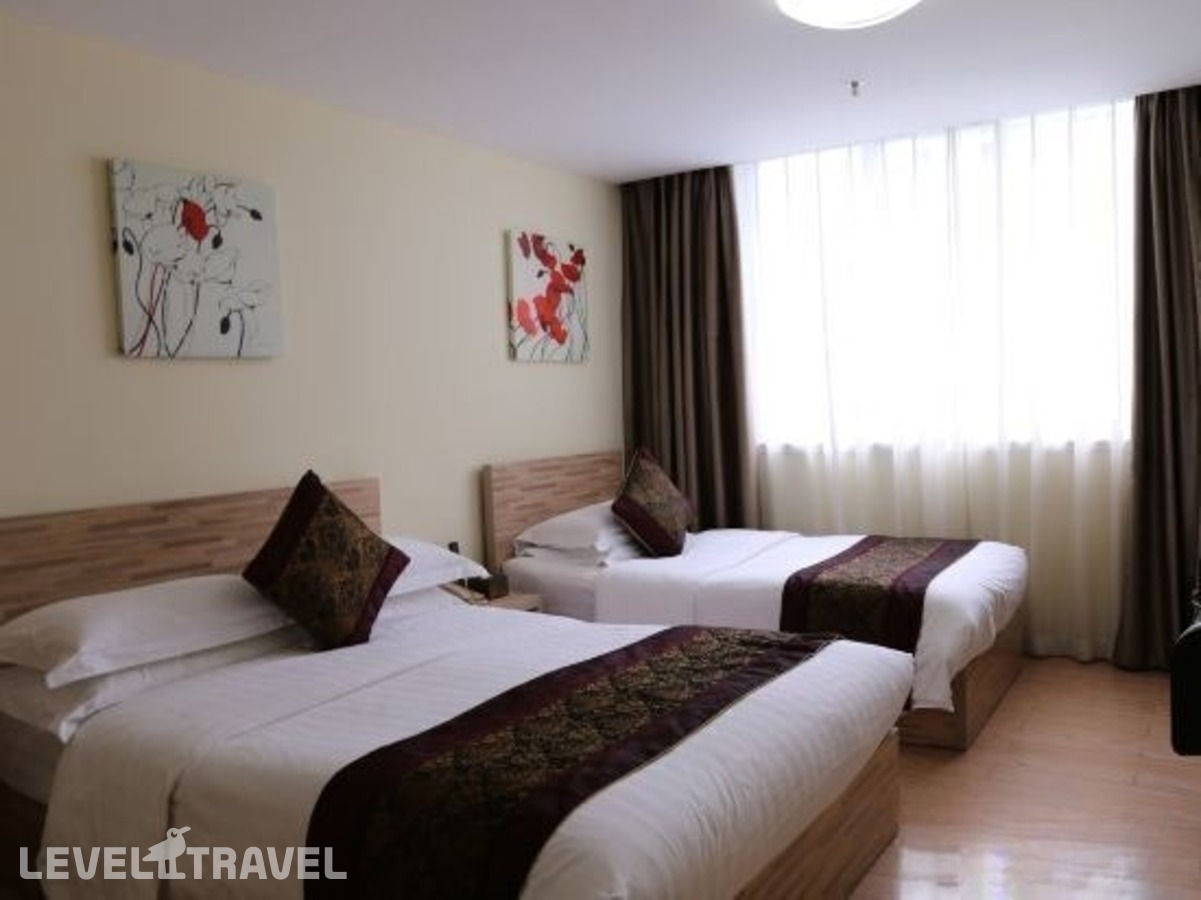 фотографии номера Номер бизнес (две односпальные кровати) отеля Baiyun City Hotel в Китай(Гуанчжоу) - фото №1