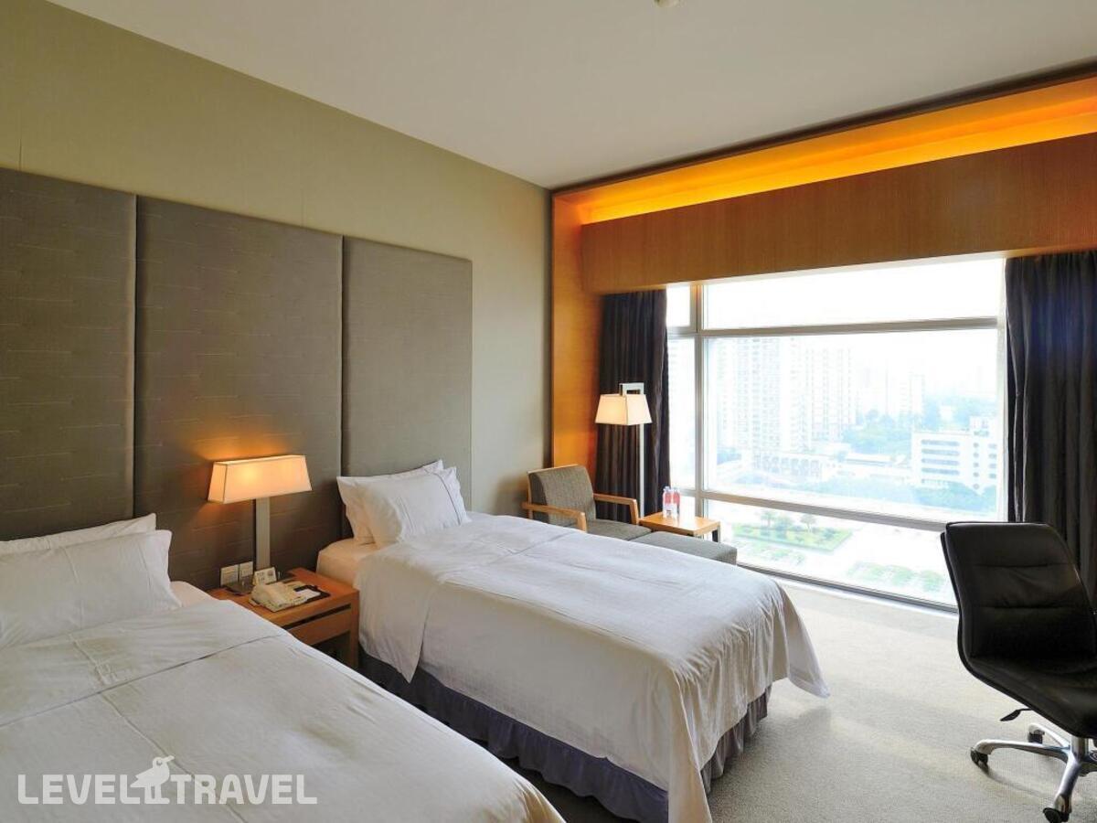 фотографии номера Улучшенный (две односпальные кровати) отеля Jianguo Hotel Guangzhou в Китай(Гуанчжоу) - фото №1