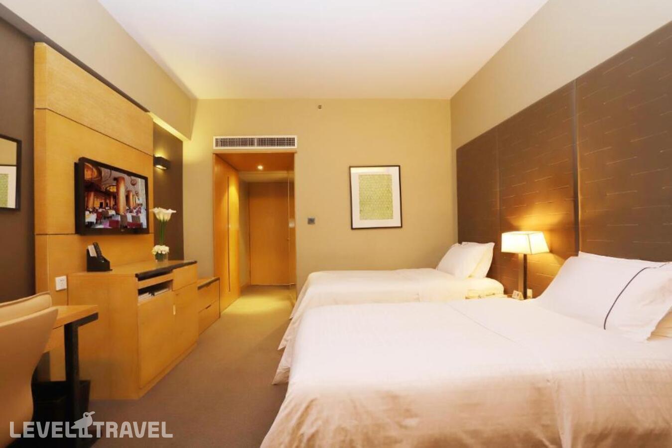 фотографии номера Улучшенный (две односпальные кровати) отеля Jianguo Hotel Guangzhou в Китай(Гуанчжоу) - фото №2