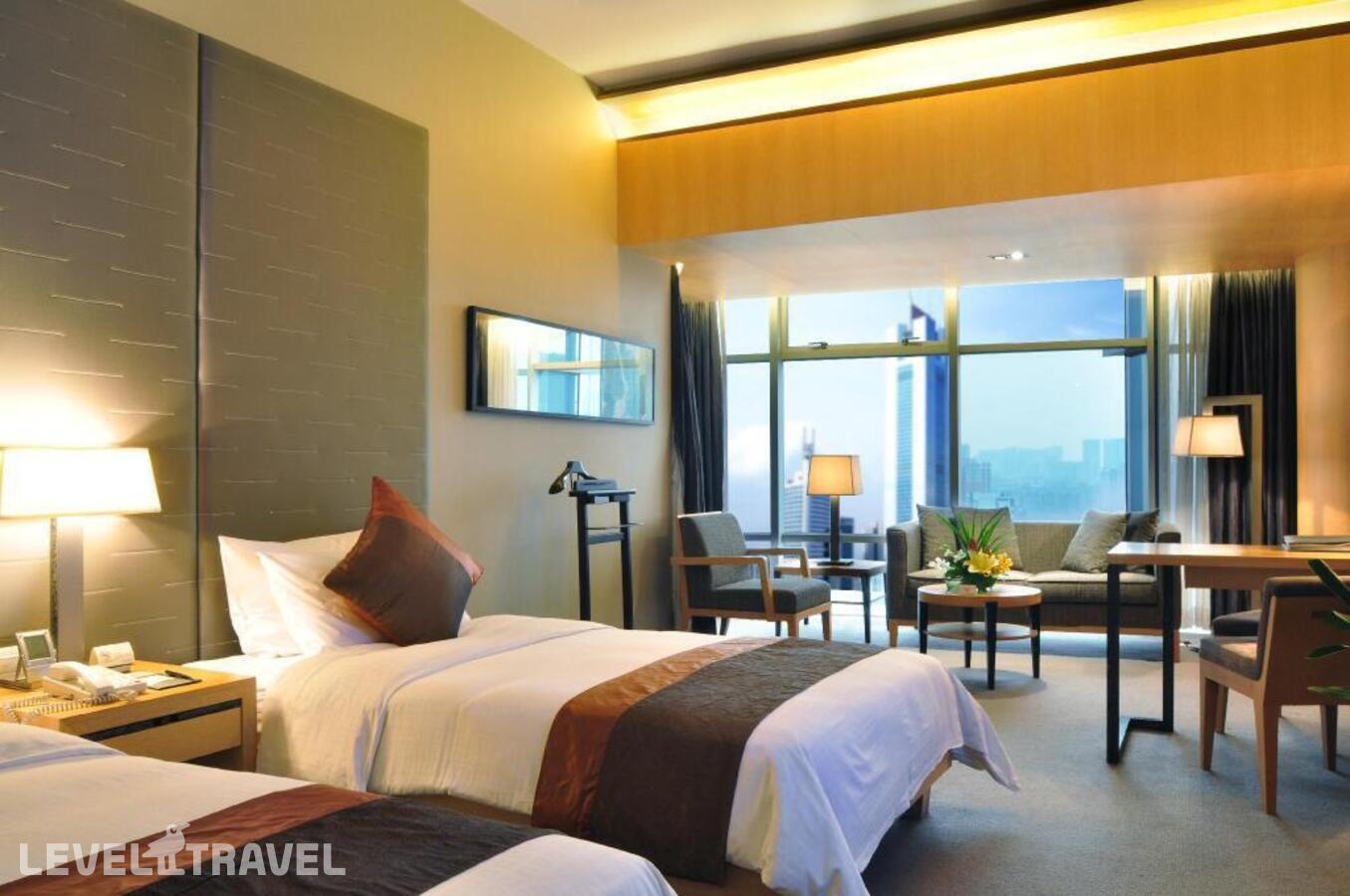 фотографии номера Делюкс (две односпальные кровати) отеля Jianguo Hotel Guangzhou в Китай(Гуанчжоу) - фото №2
