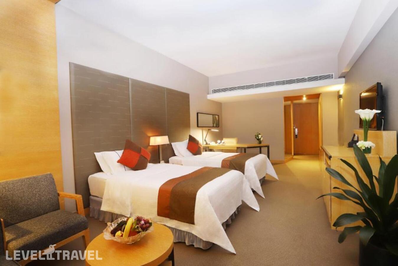 фотографии номера Делюкс (две односпальные кровати) отеля Jianguo Hotel Guangzhou в Китай(Гуанчжоу) - фото №1