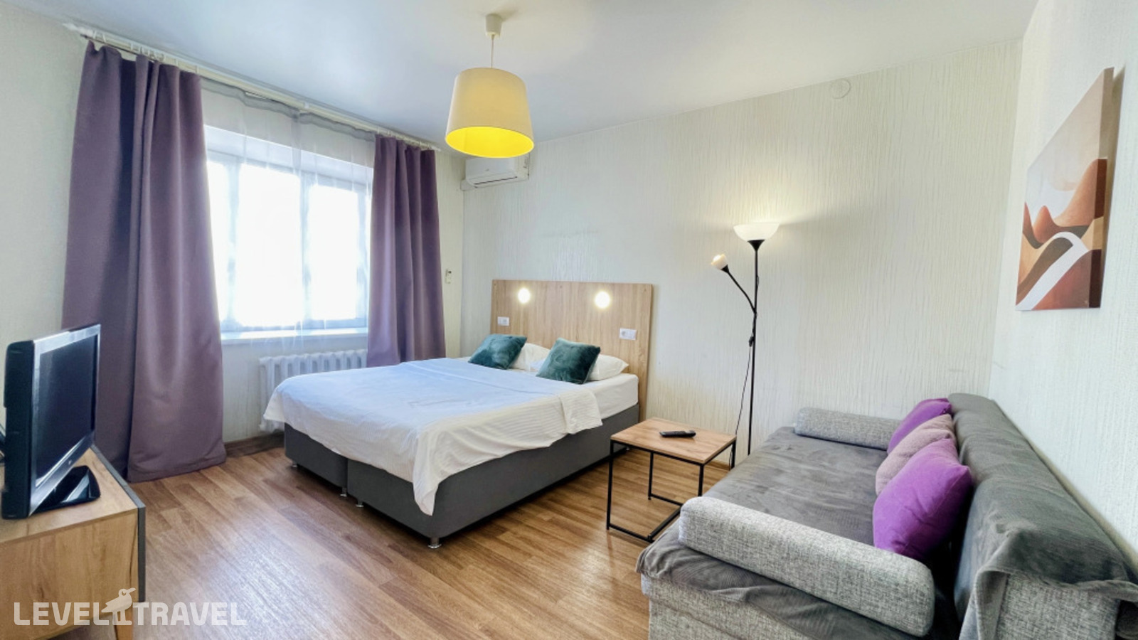 фотографии номера Двухместные апартаменты Comfort с балконом двуспальная кровать отеля Волшебный край на улице Менделеева в Россия(Уфа) - фото №8