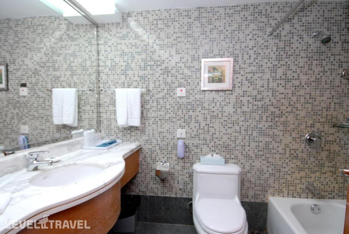 фотографии номера Стандартный (две односпальные кровати) отеля Yihe Hotel Ouzhuang в Китай(Гуанчжоу) - фото №2