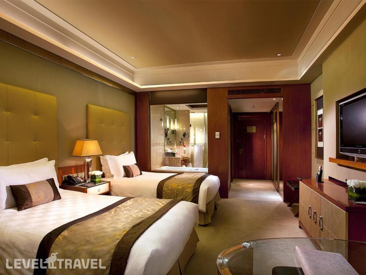 фотографии номера Улучшенный (две односпальные кровати) отеля Sofitel Harbin в Китай(Харбин) - фото №1