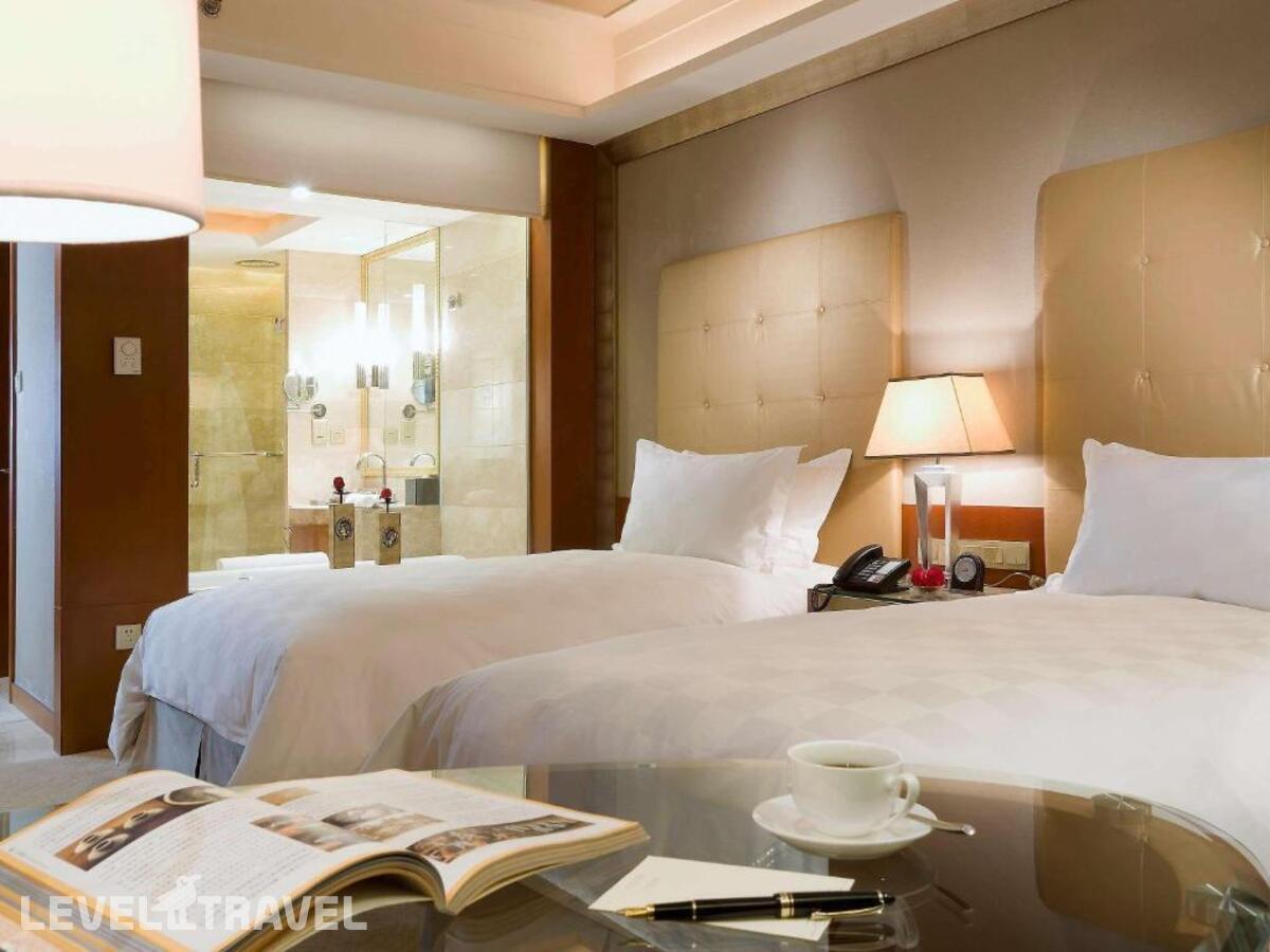 фотографии номера Улучшенный (две односпальные кровати) отеля Sofitel Harbin в Китай(Харбин) - фото №2