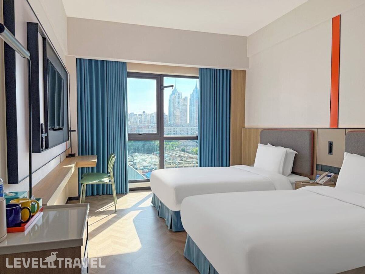 фотографии номера Стандартный (две односпальные кровати) отеля Holiday Inn Express Putuo Shanghai в Китай(Шанхай) - фото №1