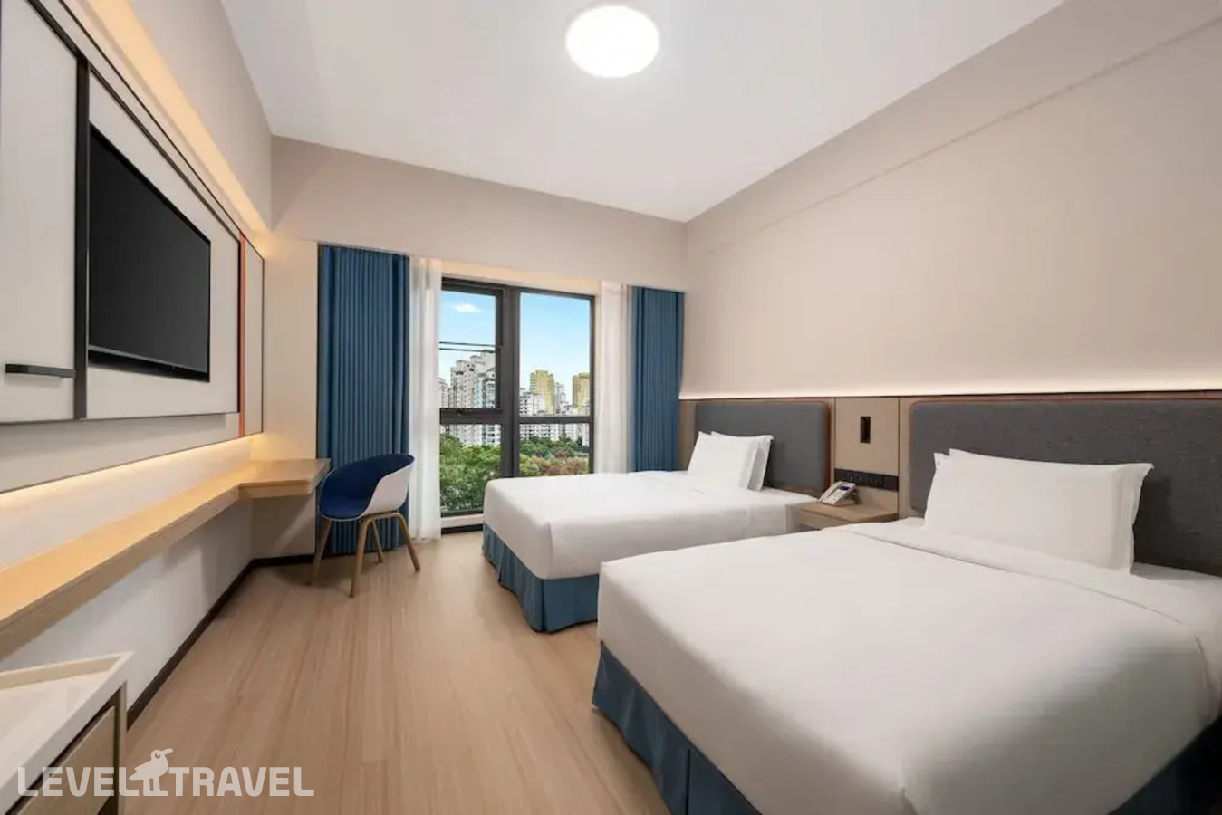 фотографии номера Четырехместный номер отеля Holiday Inn Express Putuo Shanghai в Китай(Шанхай) - фото №9