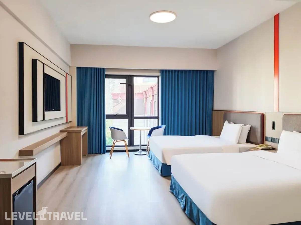 фотографии номера Четырехместный номер отеля Holiday Inn Express Putuo Shanghai в Китай(Шанхай) - фото №3