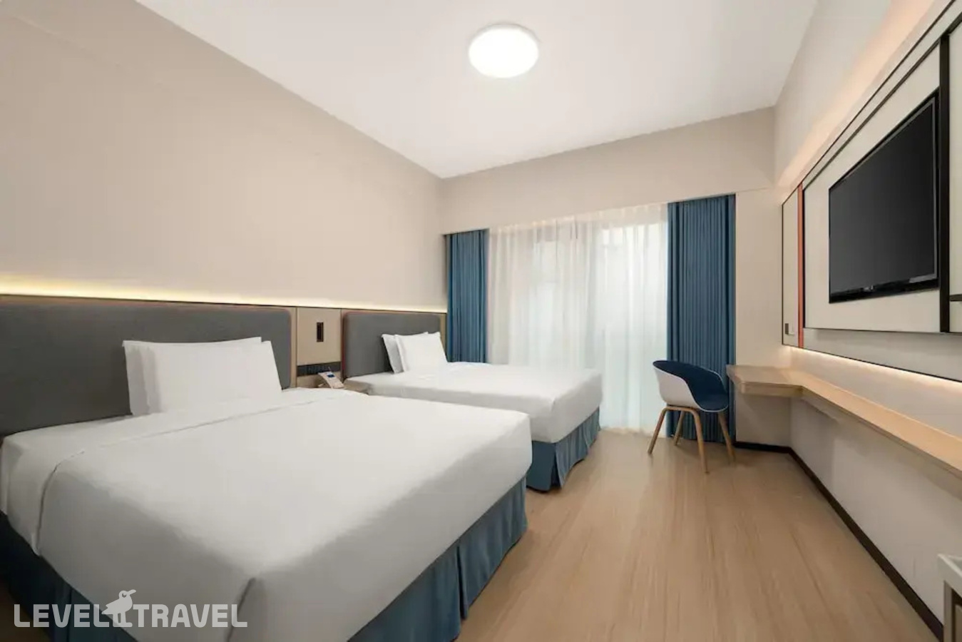 фотографии номера Четырехместный номер отеля Holiday Inn Express Putuo Shanghai в Китай(Шанхай) - фото №10