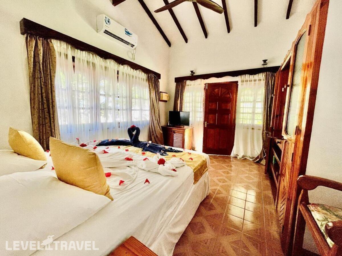 фотографии номера Стандартный с видом на горы отеля Villa Chez Batista в Сейшелы(о. Маэ) - фото №1