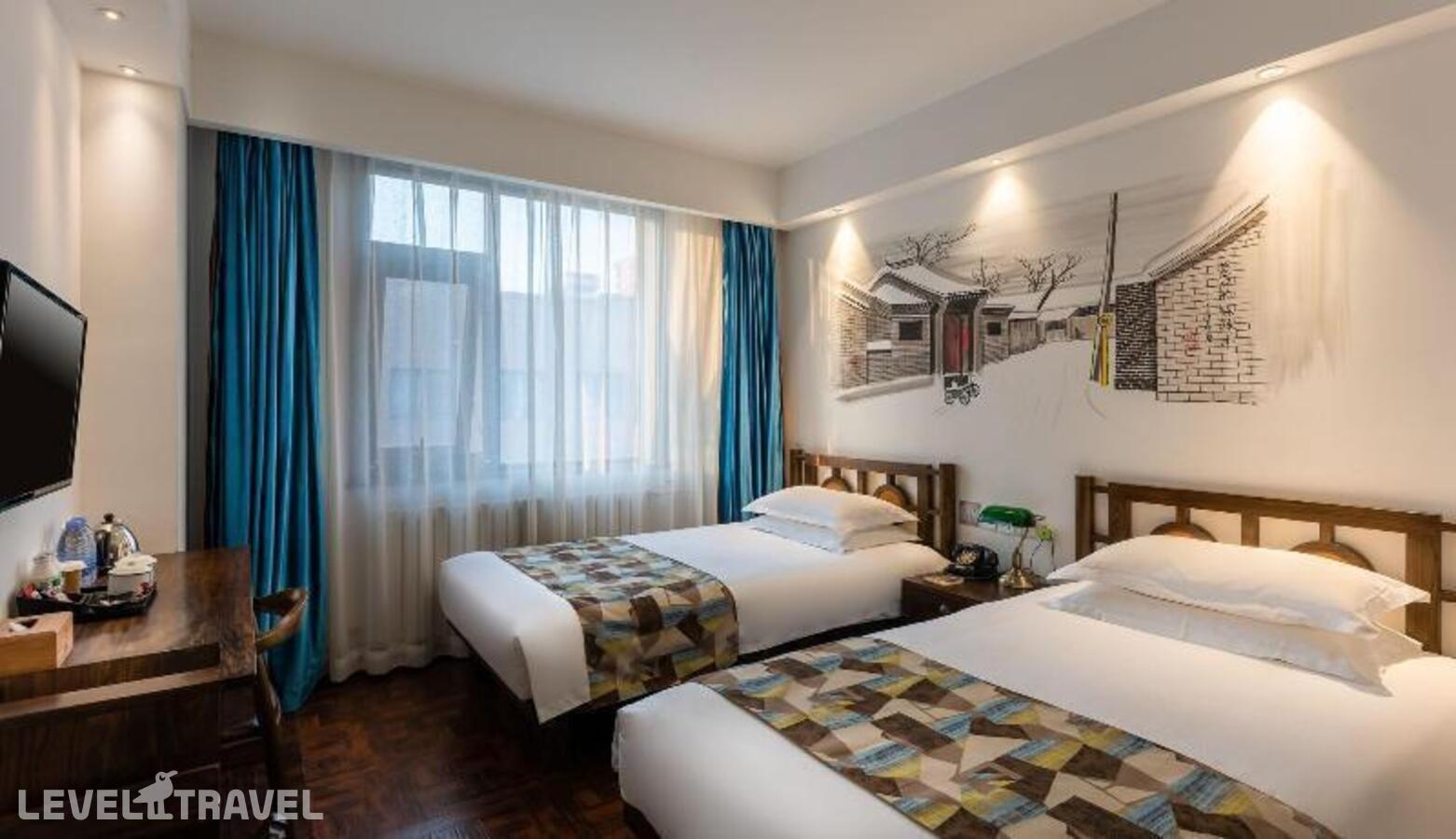 фотографии номера Номер бизнес (две односпальные кровати) отеля Nostalgia Hotel Near Beijing Panjiayuan Antique Market (Ex. Nostalgia Hotel Beijing Guomao Branch) в Китай(Пекин) - фото №3