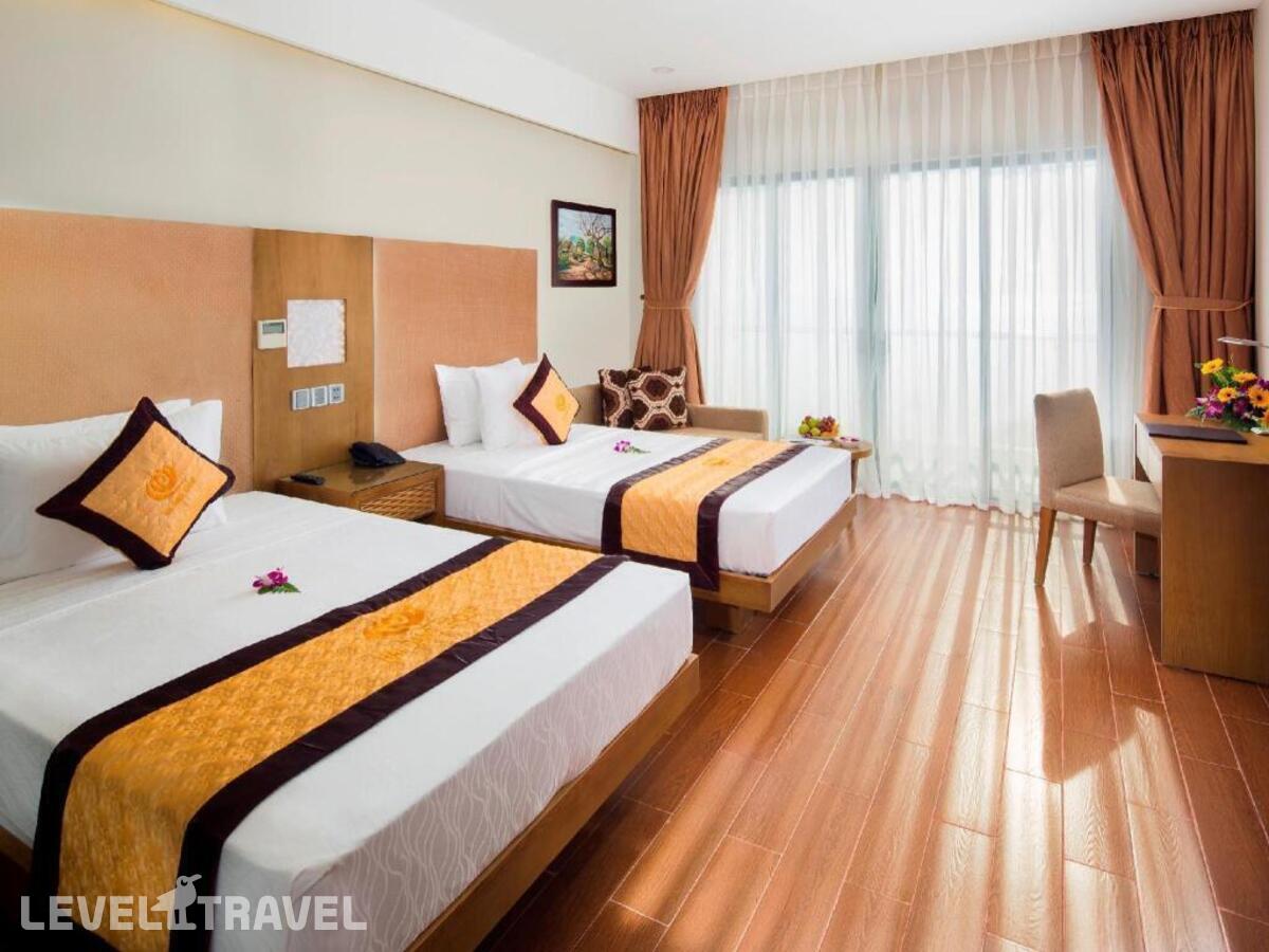 фотографии номера Делюкс (две односпальные кровати) отеля Galina Hotel & Spa в Вьетнам(Нячанг) - фото №5