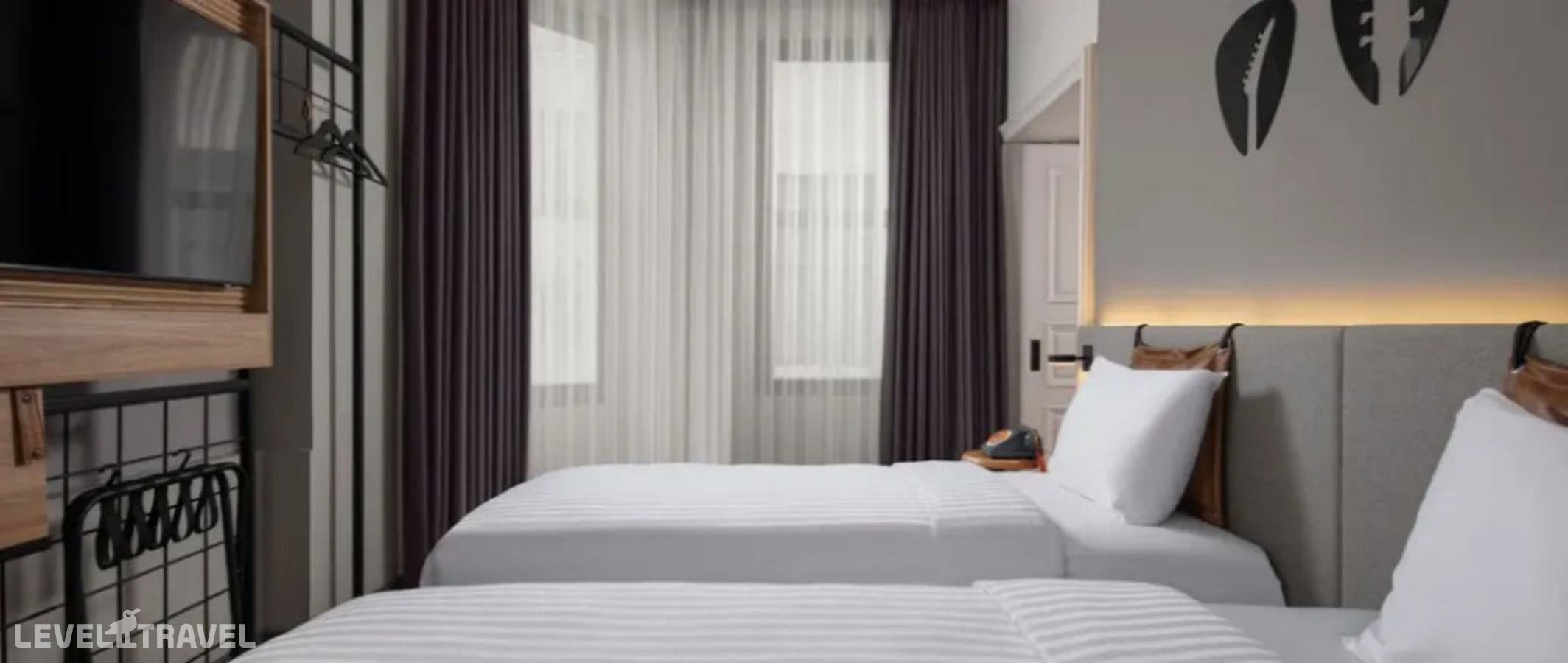 Двухместный номер Moxy 2 отдельные кровати — фото 1