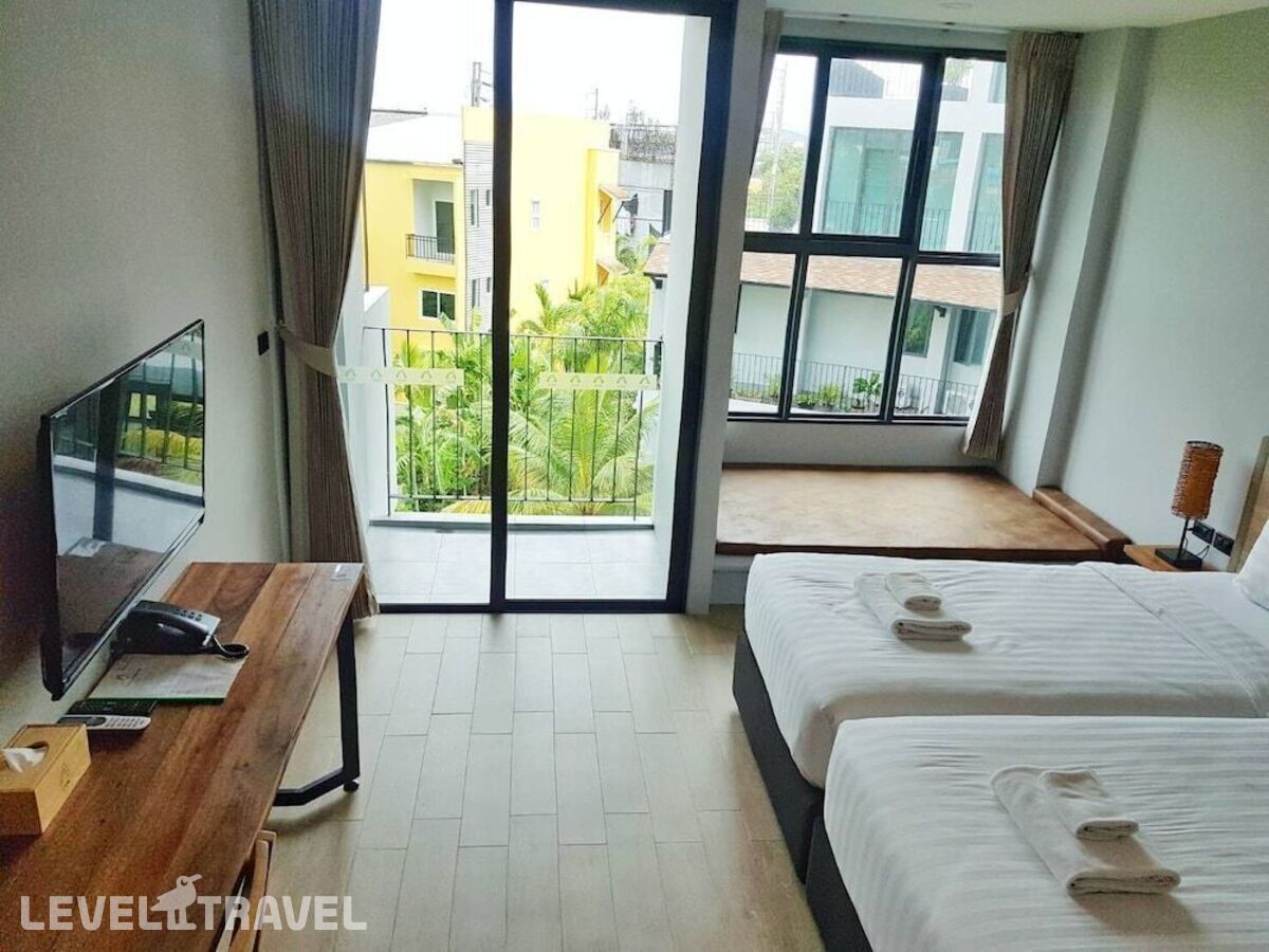 фотографии номера Улучшенный (две односпальные кровати) отеля Atom Phuket Hotel в Таиланд(Най Янг Бич) - фото №6