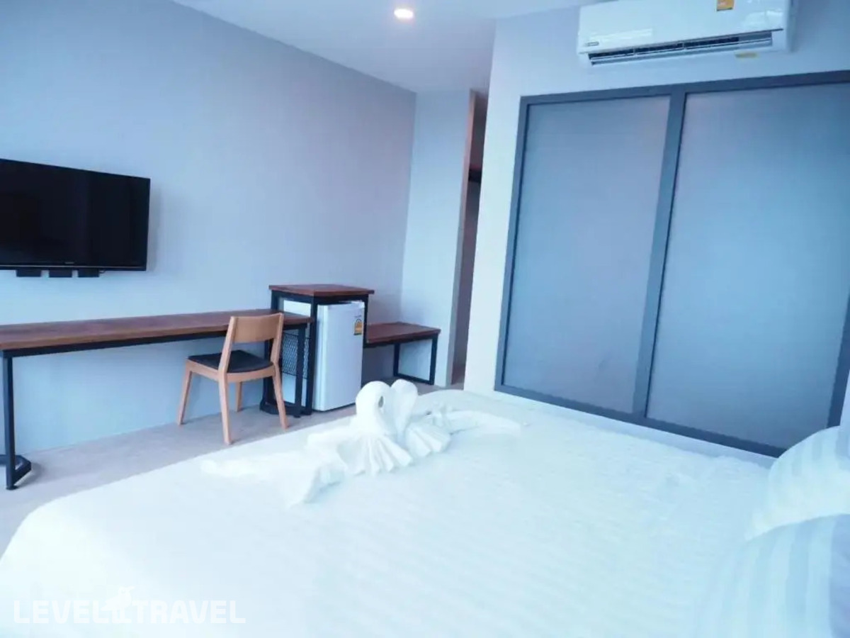 фотографии номера Делюкс с видом на бассейн отеля Atom Phuket Hotel в Таиланд(Най Янг Бич) - фото №7