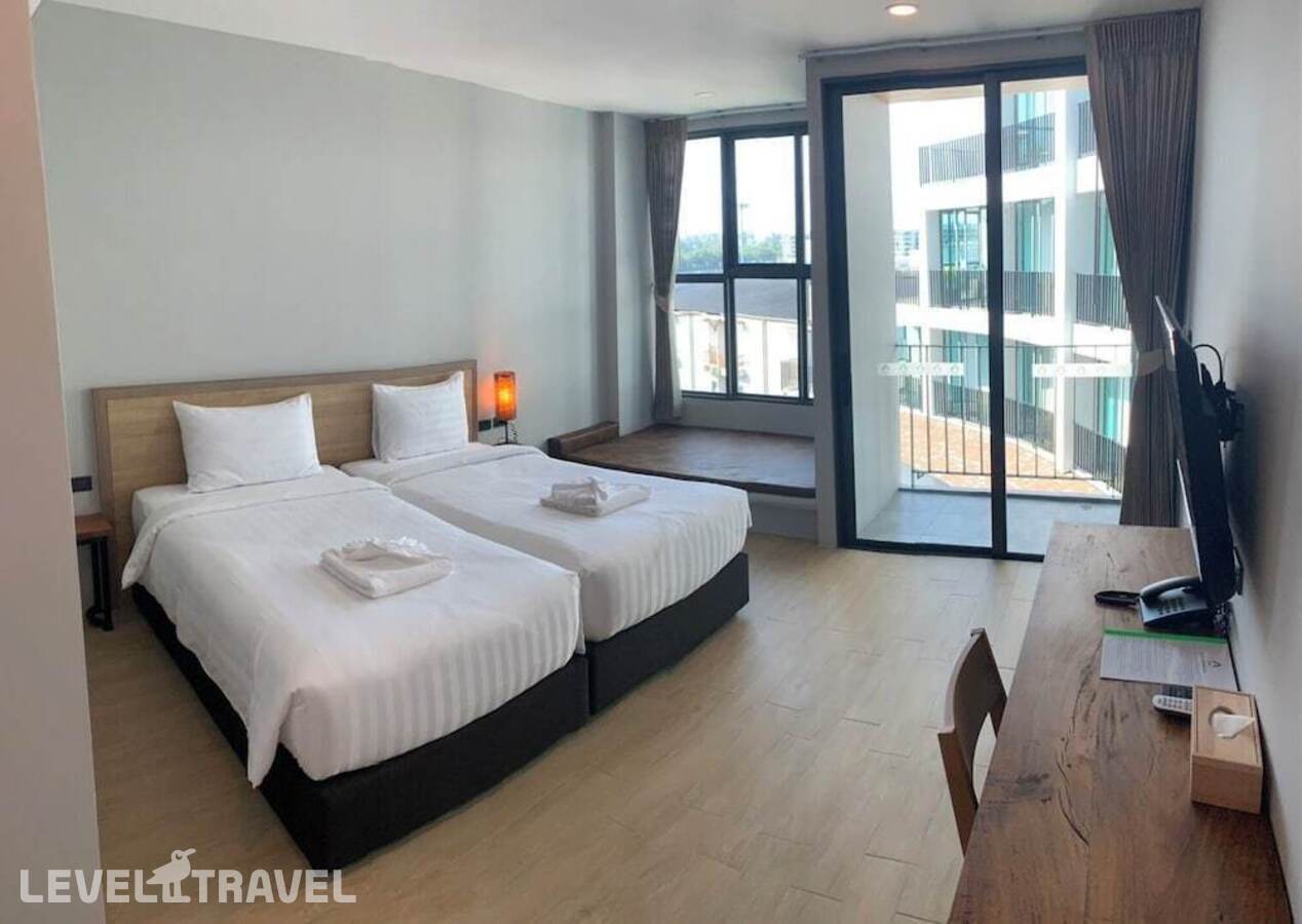 фотографии номера Делюкс (две односпальные кровати) отеля Atom Phuket Hotel в Таиланд(Най Янг Бич) - фото №14