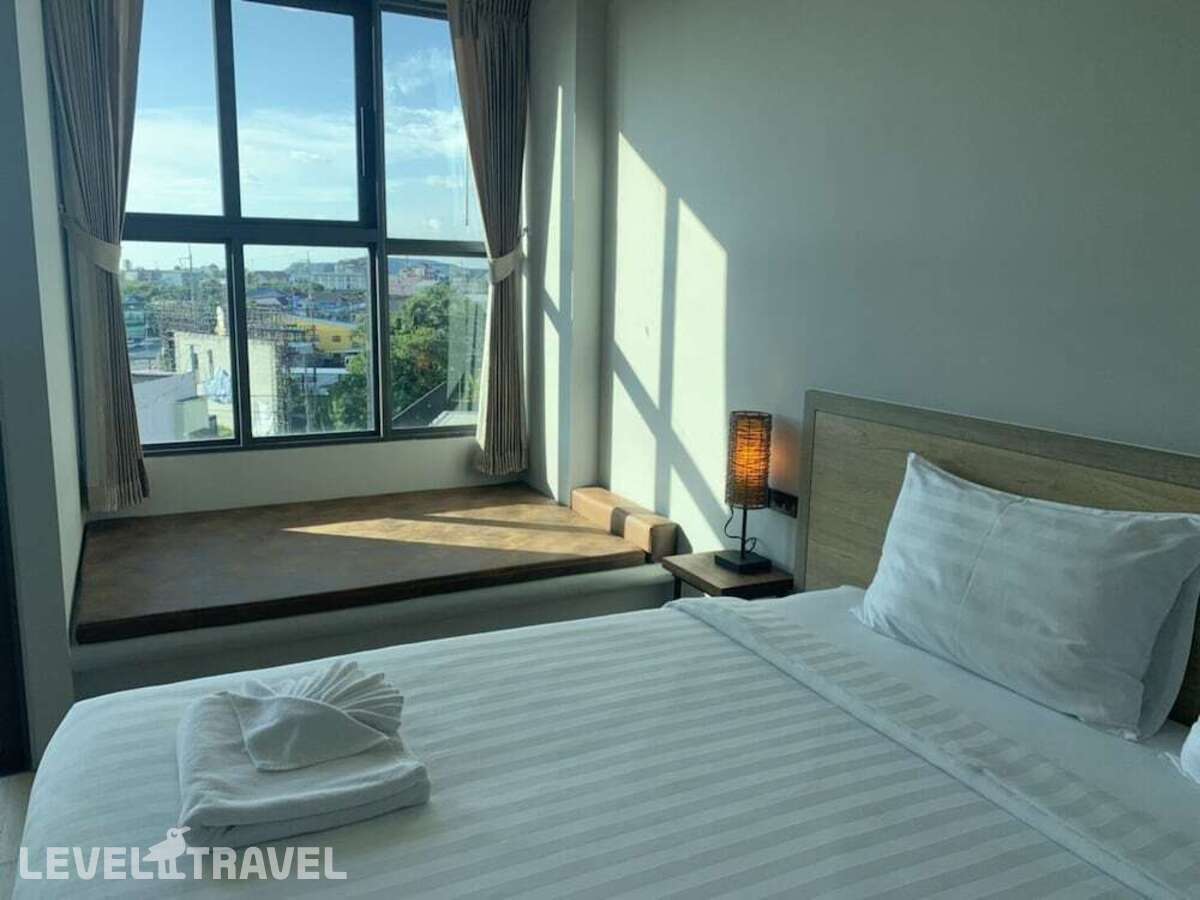 фотографии номера Делюкс (две односпальные кровати) отеля Atom Phuket Hotel в Таиланд(Най Янг Бич) - фото №5