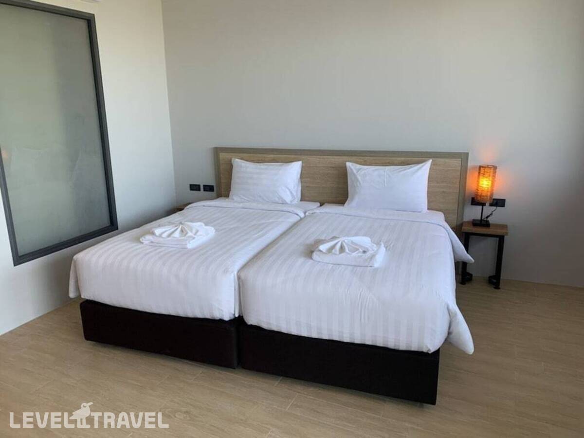 фотографии номера Делюкс (две односпальные кровати) отеля Atom Phuket Hotel в Таиланд(Най Янг Бич) - фото №3
