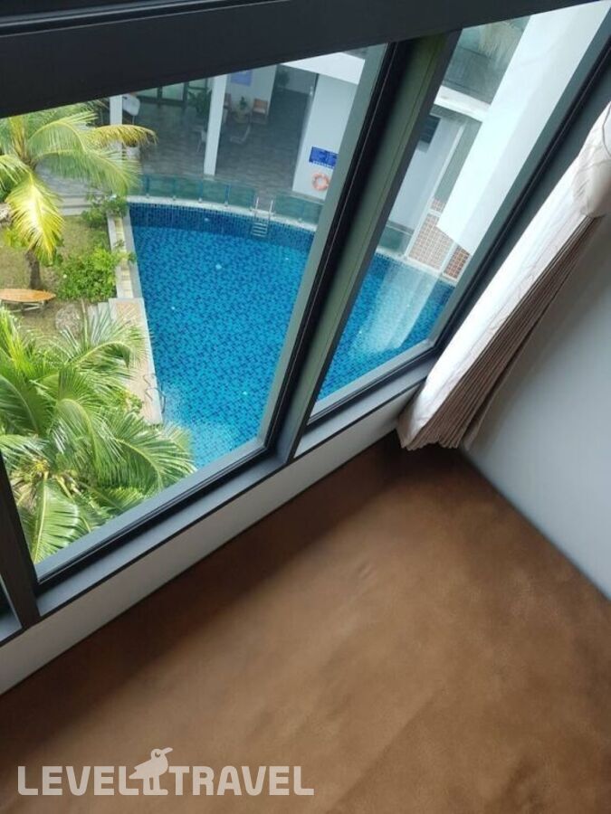 фотографии номера Делюкс (две односпальные кровати) отеля Atom Phuket Hotel в Таиланд(Най Янг Бич) - фото №10