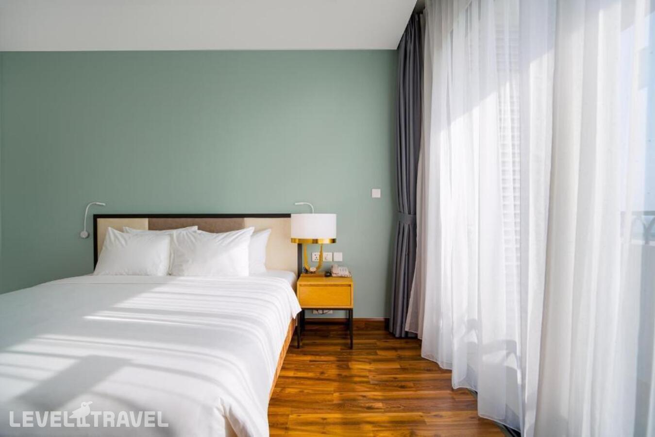 фотографии номера Улучшенный с видом на бассейн отеля Wyndham Garden Grandworld Phu Quoc в Вьетнам(Фукуок) - фото №2