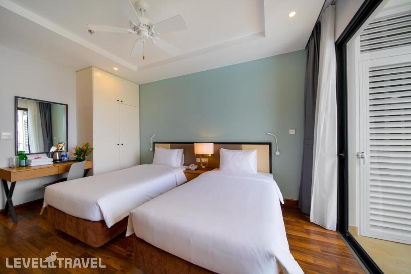 фотографии номера Улучшенный (две односпальные кровати) отеля Wyndham Garden Grandworld Phu Quoc в Вьетнам(Фукуок) - фото №5