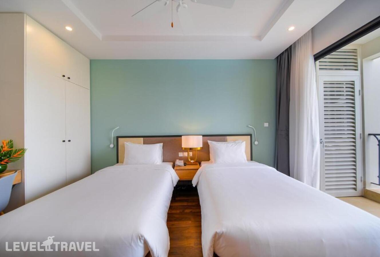 фотографии номера Улучшенный (две односпальные кровати) отеля Wyndham Garden Grandworld Phu Quoc в Вьетнам(Фукуок) - фото №1