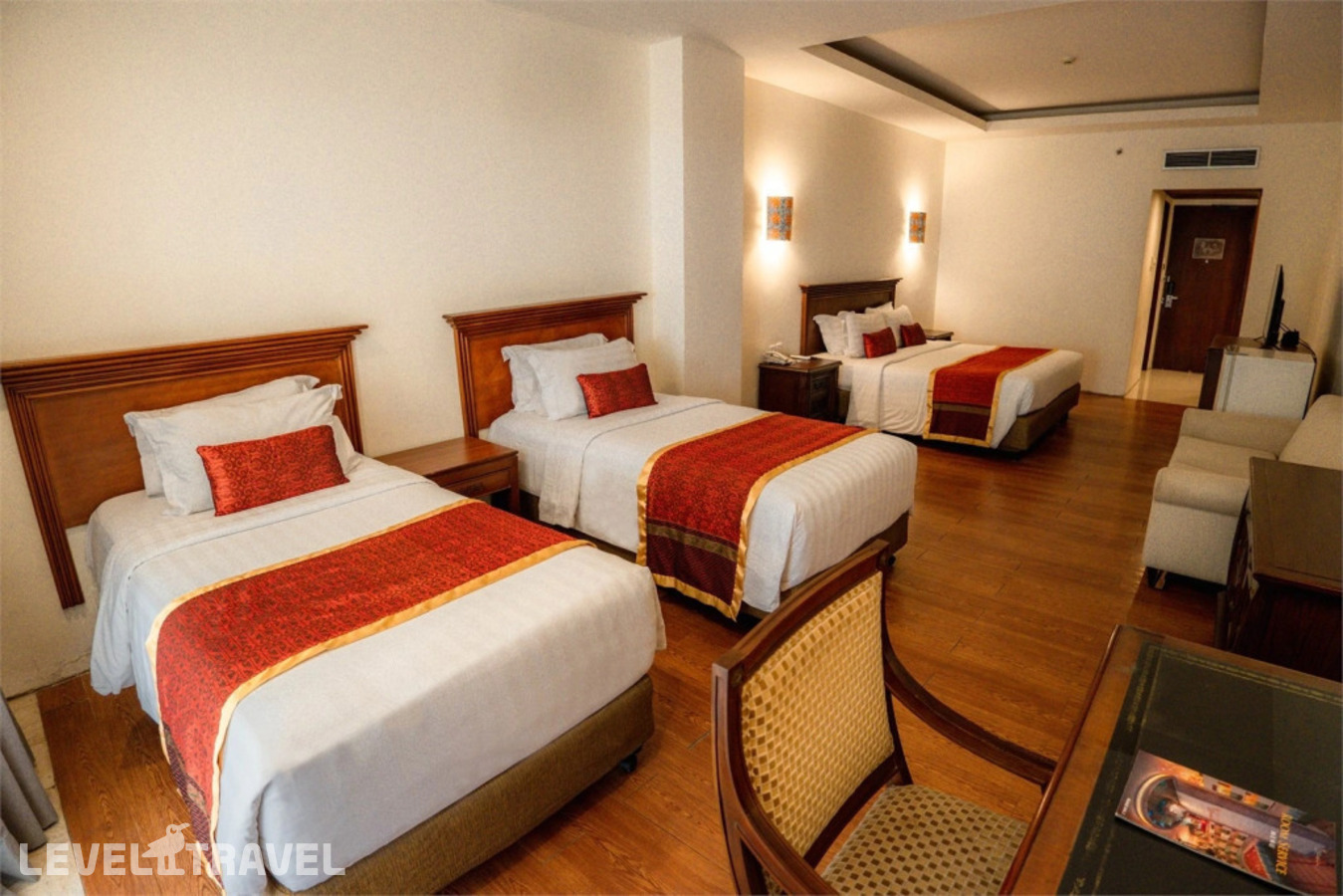 фотографии номера Семейный номер отеля Kuta Paradiso Hotel в Индонезия(Кута) - фото №1