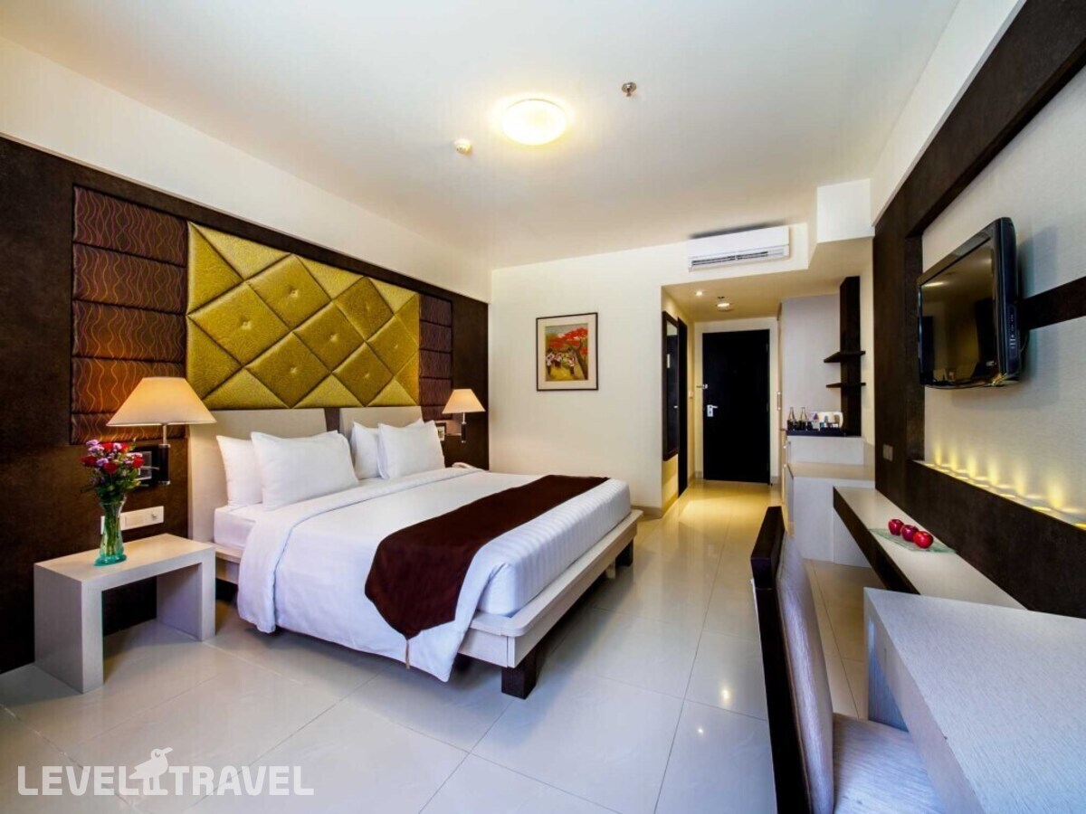 фотографии номера Улучшенный (две односпальные кровати) отеля Aston Kuta Hotel Residence в Индонезия(Кута) - фото №1