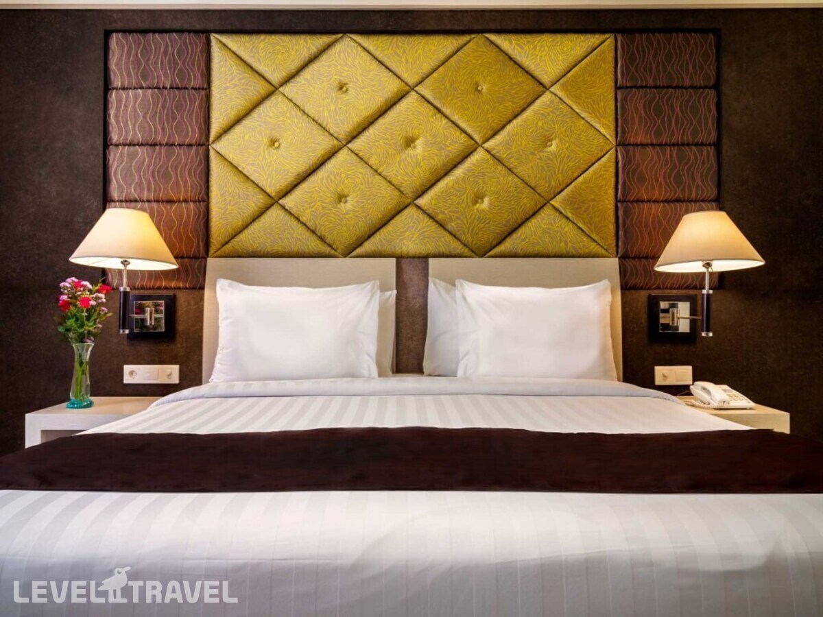 фотографии номера Улучшенный (две односпальные кровати) отеля Aston Kuta Hotel Residence в Индонезия(Кута) - фото №3