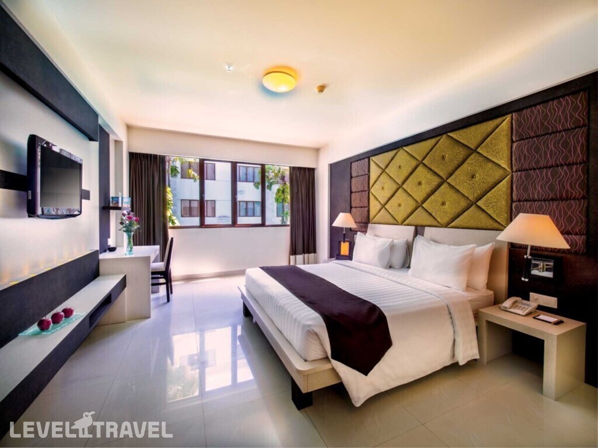 фотографии номера Улучшенный (две односпальные кровати) отеля Aston Kuta Hotel Residence в Индонезия(Кута) - фото №2