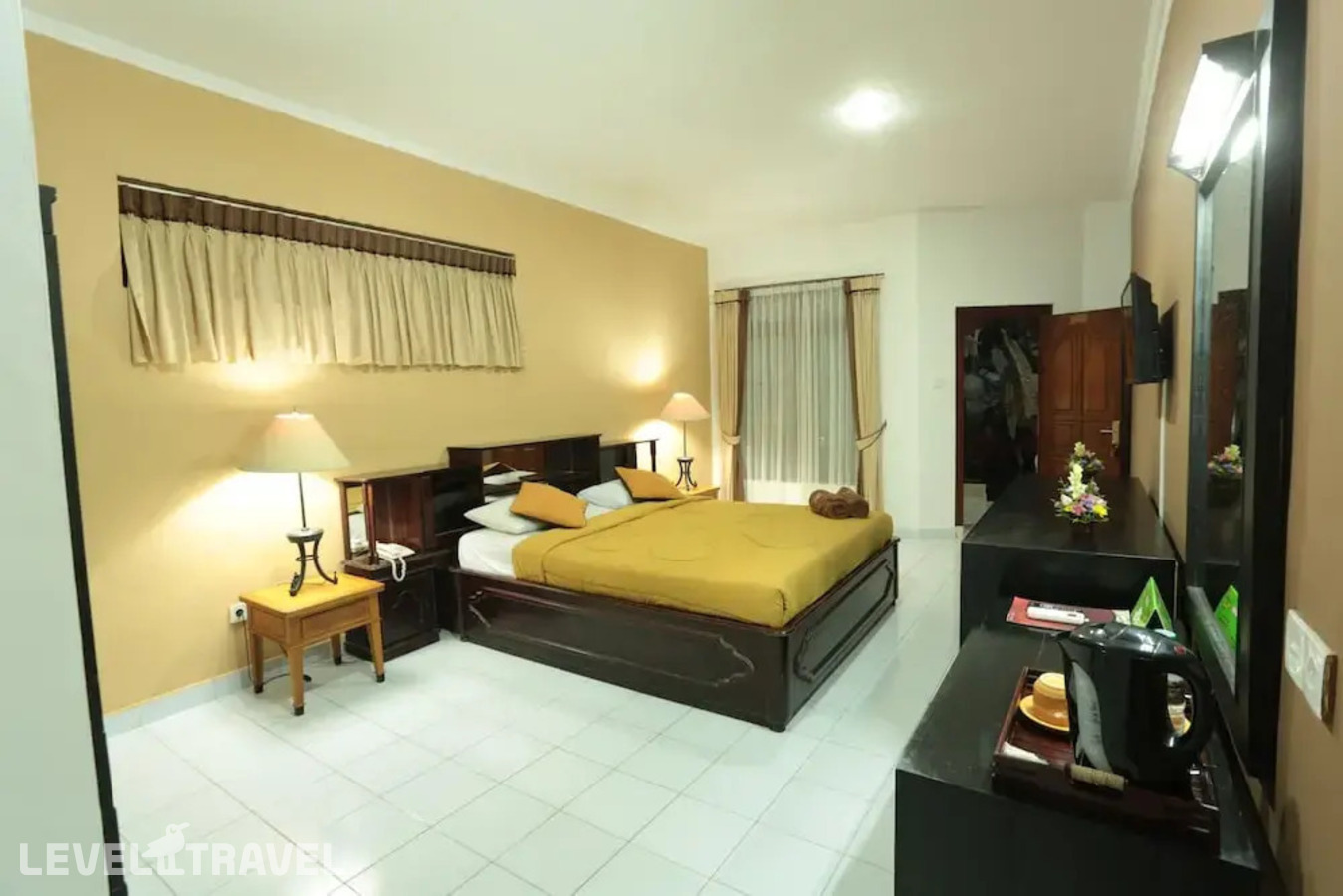 фотографии номера Улучшенный номер отеля La Walon Hotel в Индонезия(Кута) - фото №6