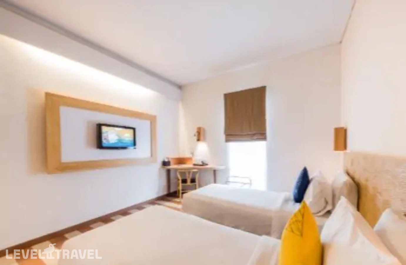 фотографии номера Улучшенный (две односпальные кровати) отеля The One Legian Hotel в Индонезия(Кута) - фото №1