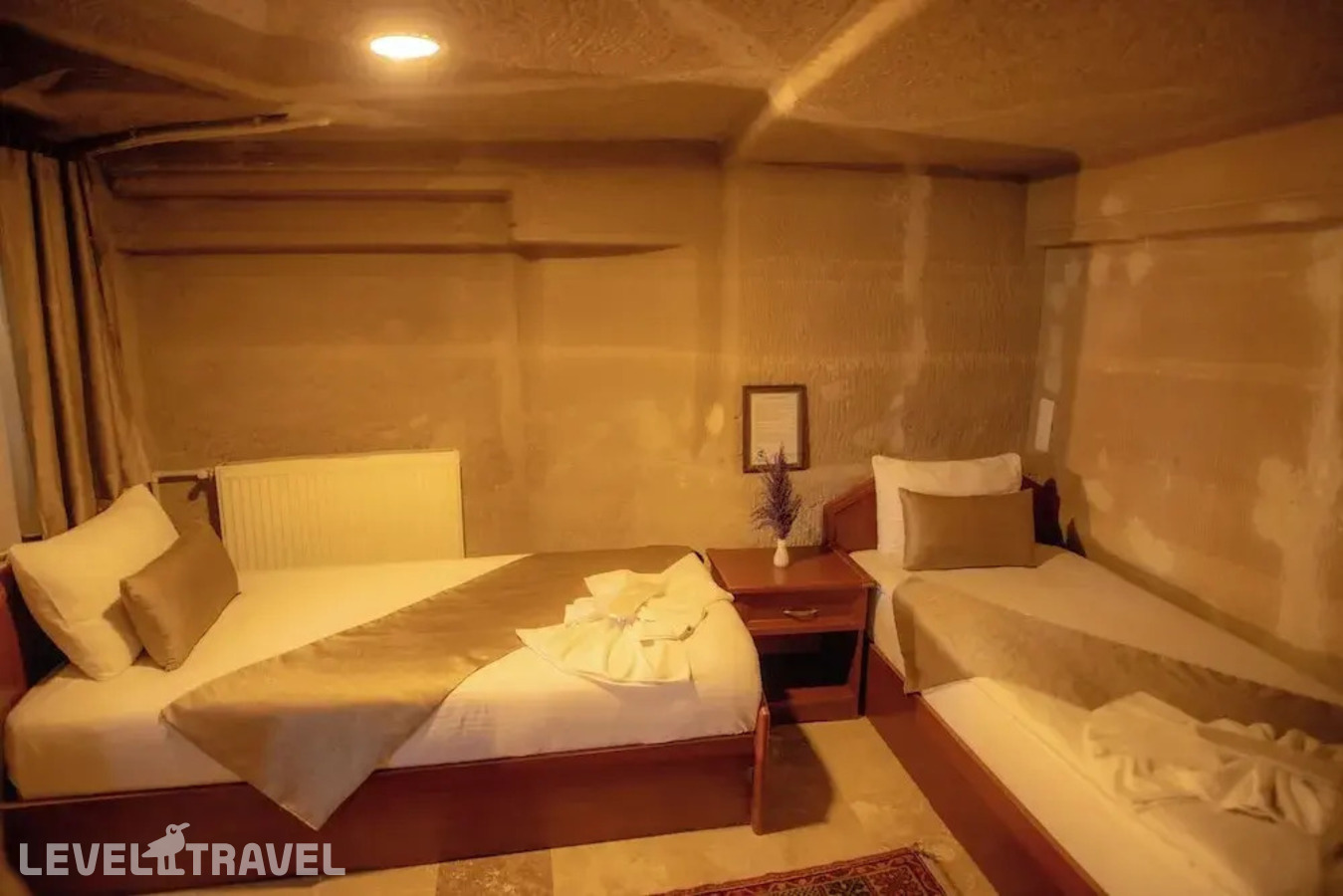 фотографии номера Четырехместный делюкс отеля Guven Cave Hotel в Турция(Гёреме) - фото №3