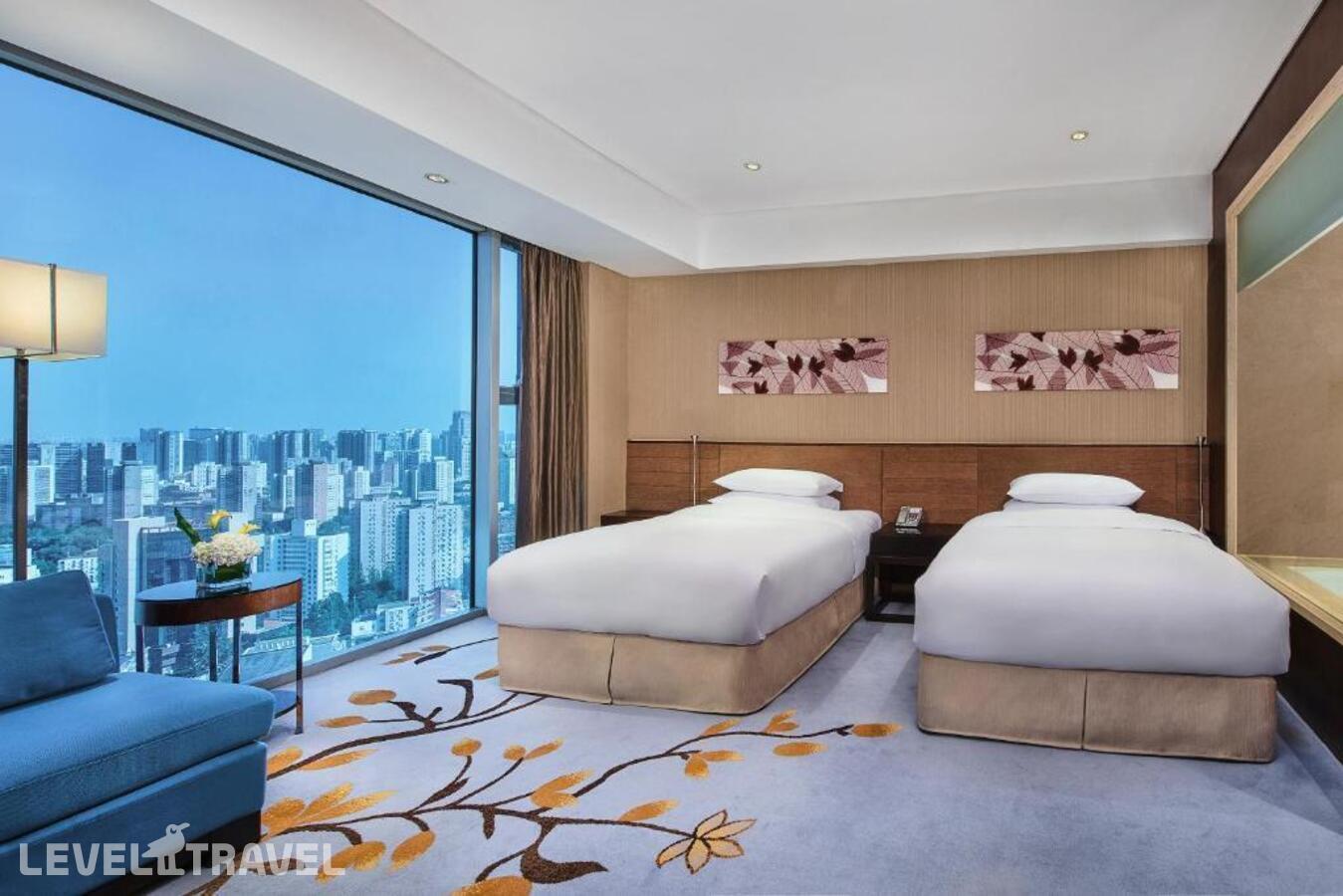фотографии номера Двухместный номер High Floor Standard 2 отдельные кровати отеля Crowne Plaza Beijing Sun Palace в Китай(Пекин) - фото №1