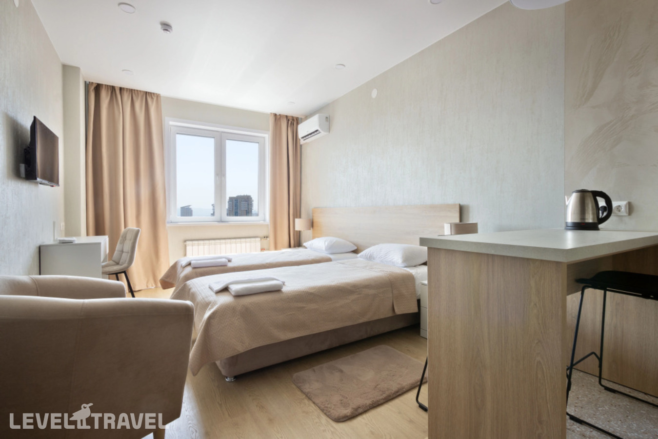 фотографии номера Делюкс (две односпальные кровати) отеля Karat Apart (Карат Апарт) Апарт-Отель в Россия(Красноярск) - фото №1
